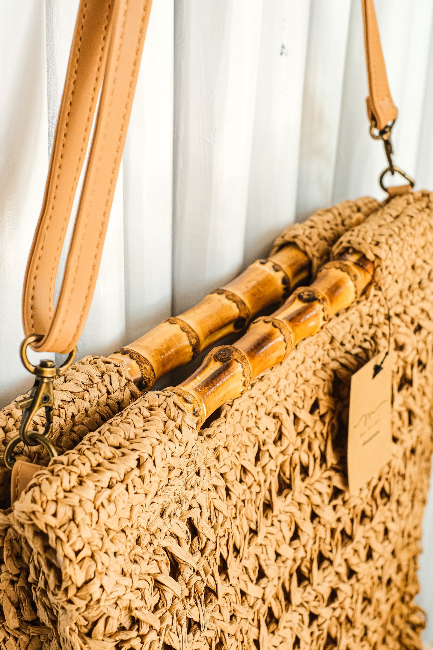 woven brown bag boho style with wooden handles