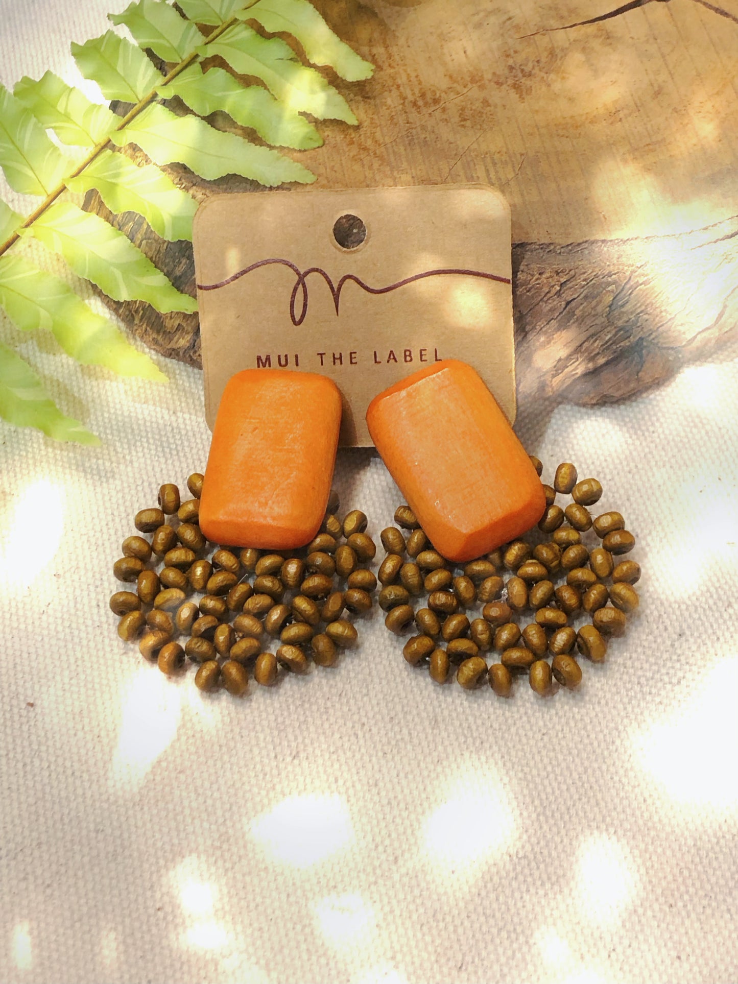 boho style orange and brown bead earrings