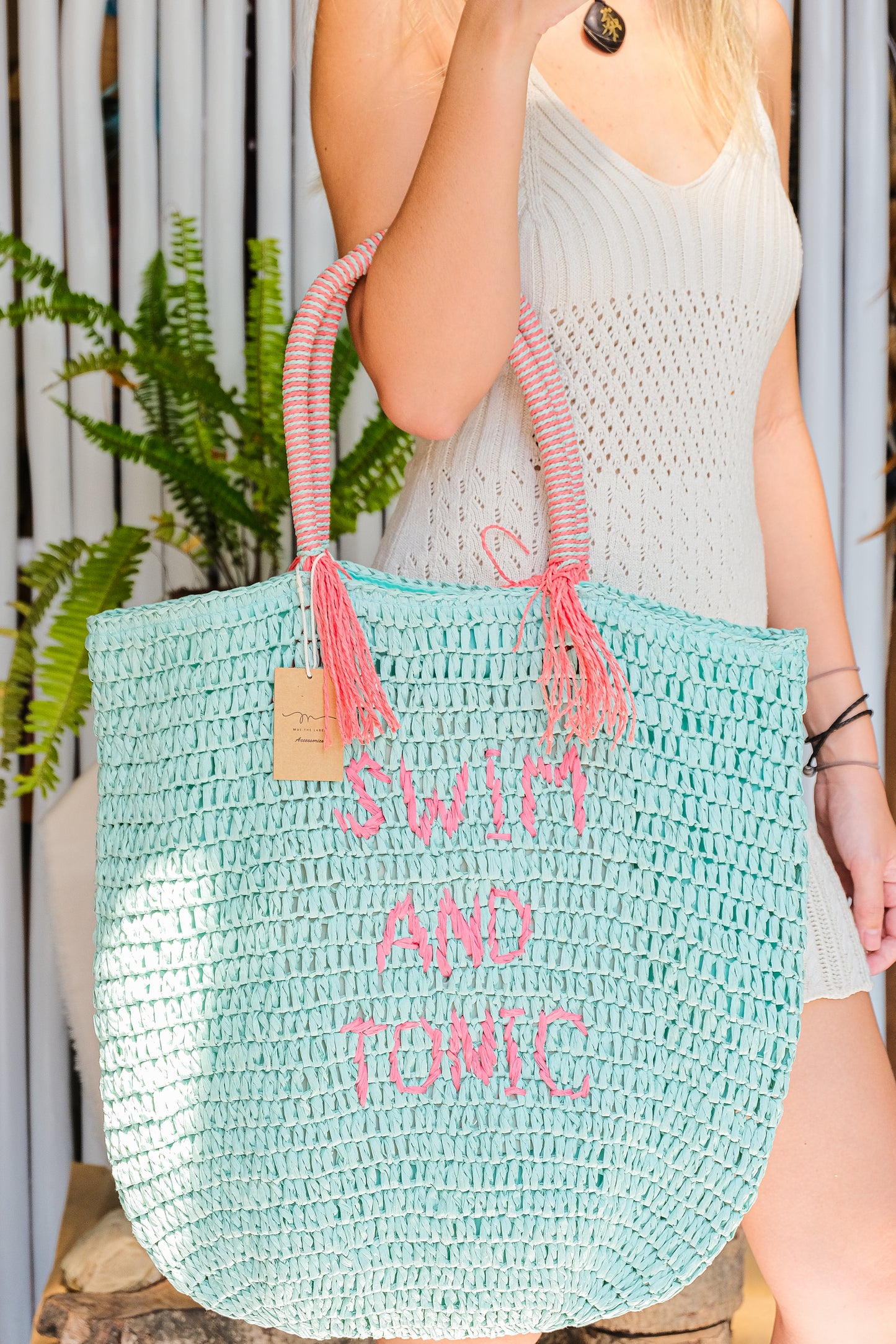 woman carrying boho style swim and tonic shoulder bag