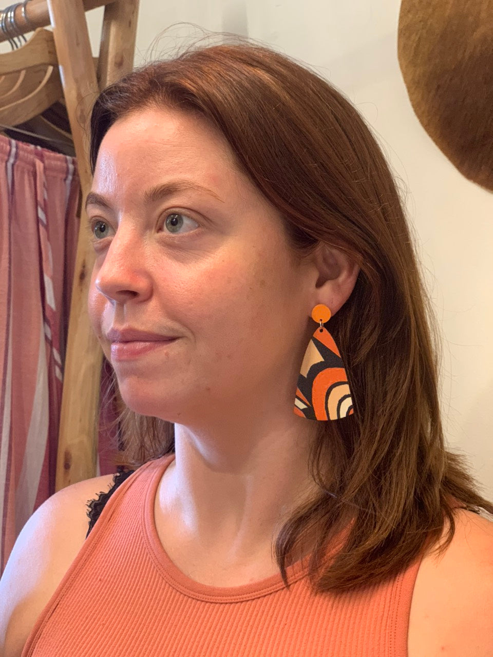 woman wearing boho style wood drop earrings