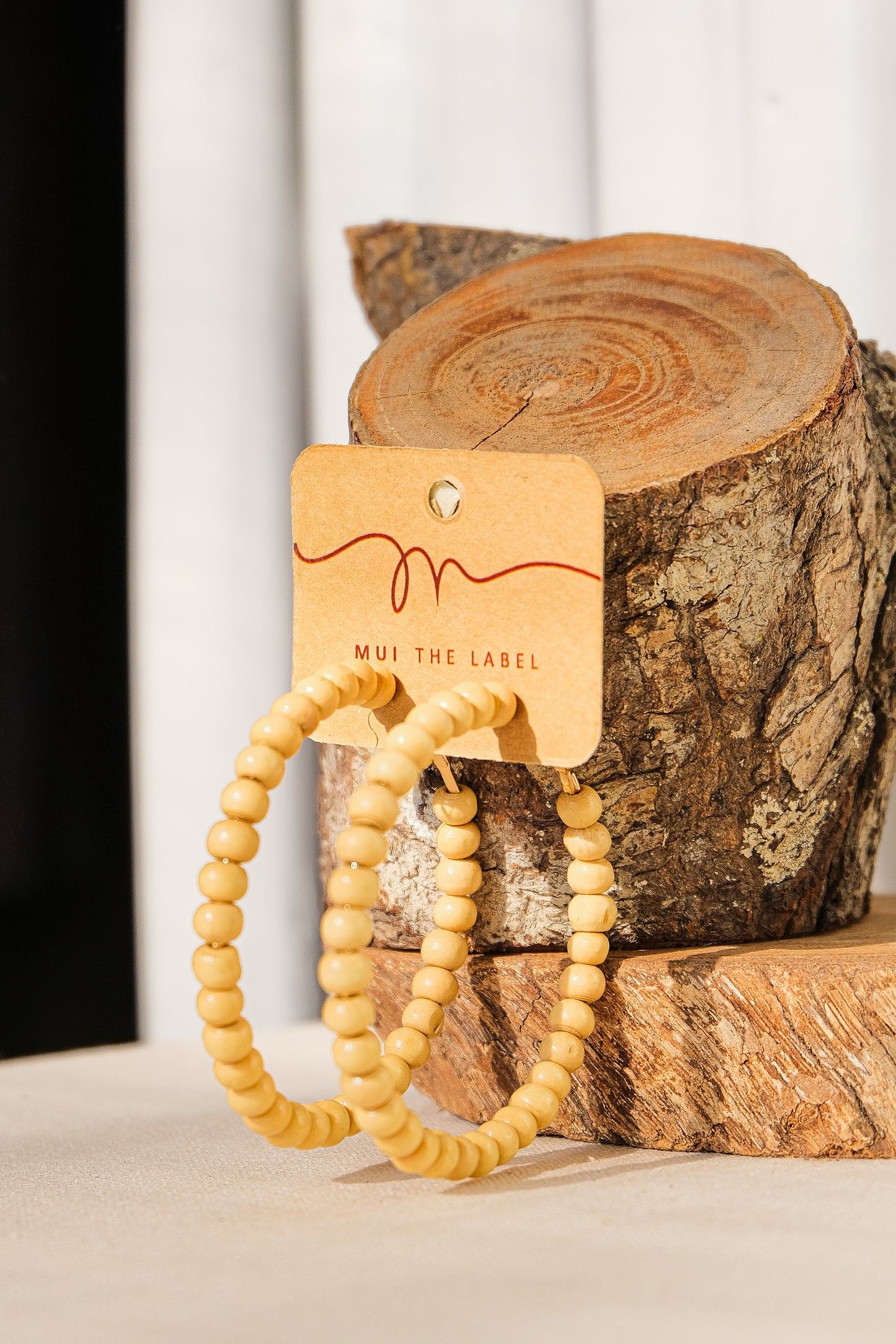 boho style wooden cream beaded earrings
