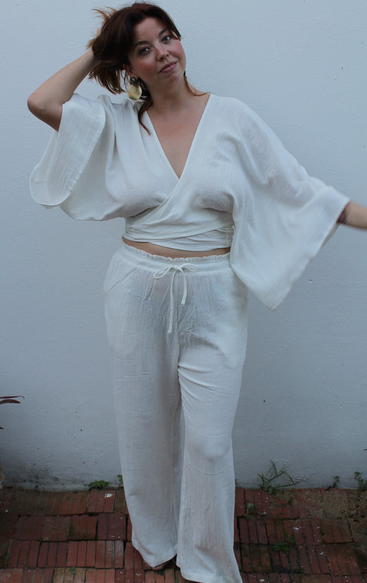 White boho style linen pants and top.