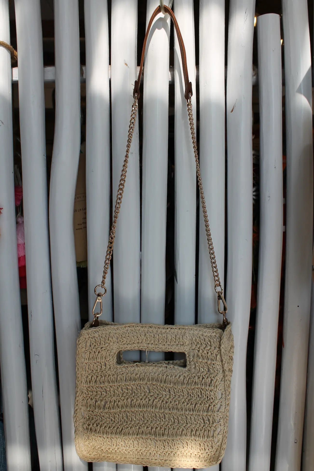 A light brown woven bag. 