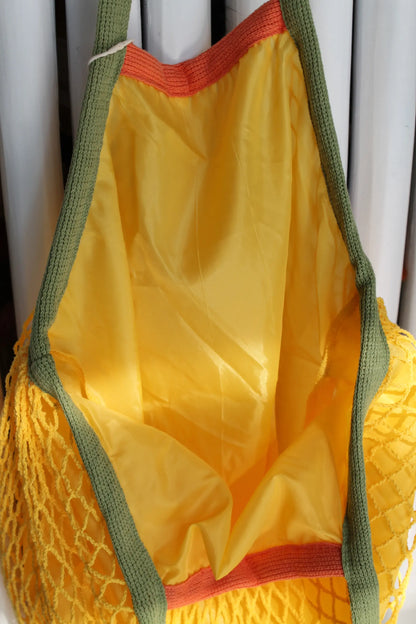 Yellow tote bag. 