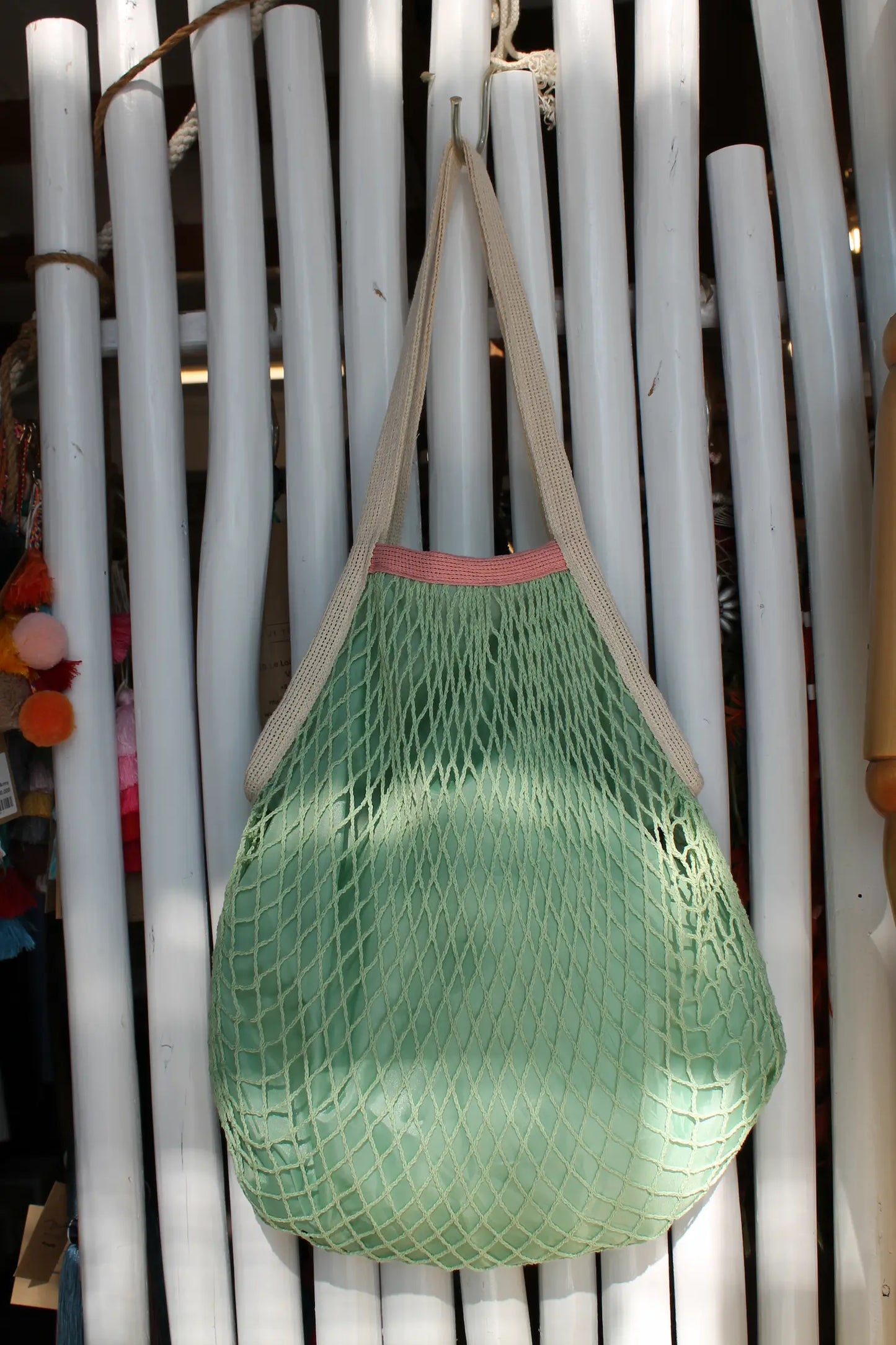 Light green tote bag. 