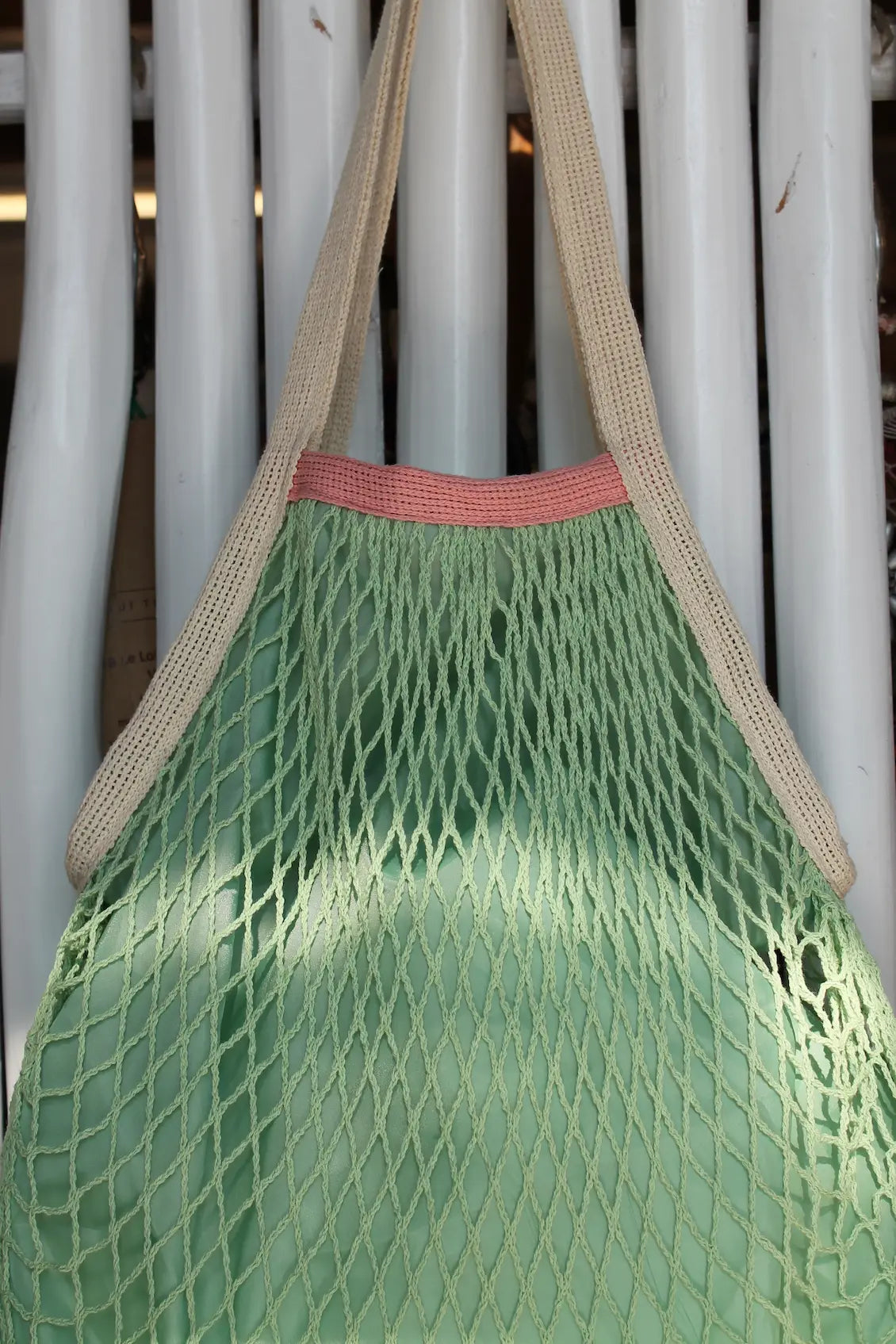 Light green tote bag. 