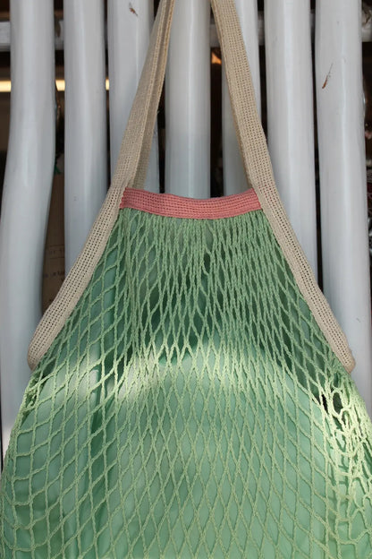 Light green tote bag. 