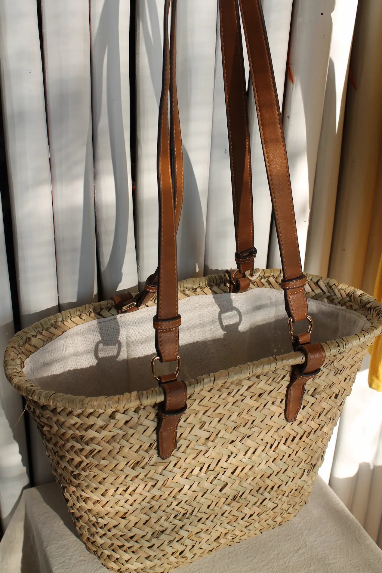 A brown woven bag.