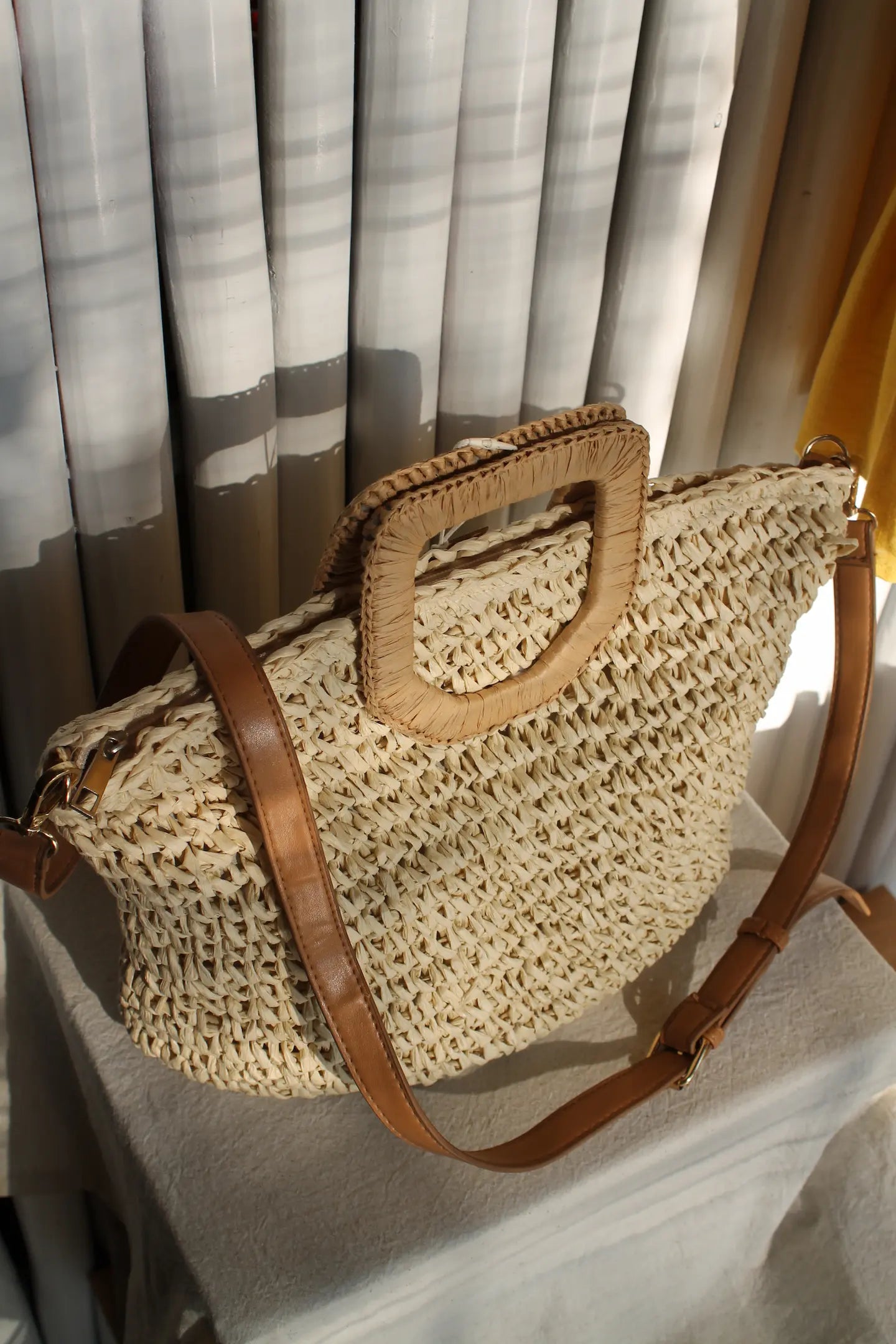 A brown woven bag.