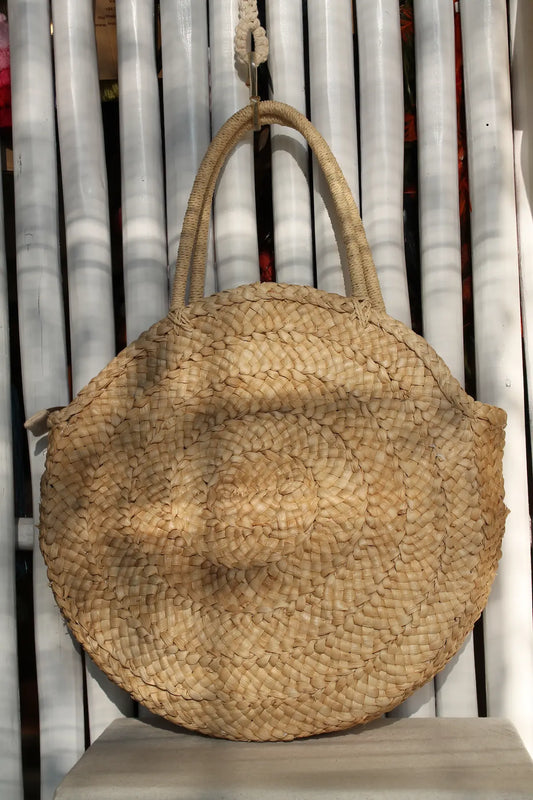 A round woven bag. 