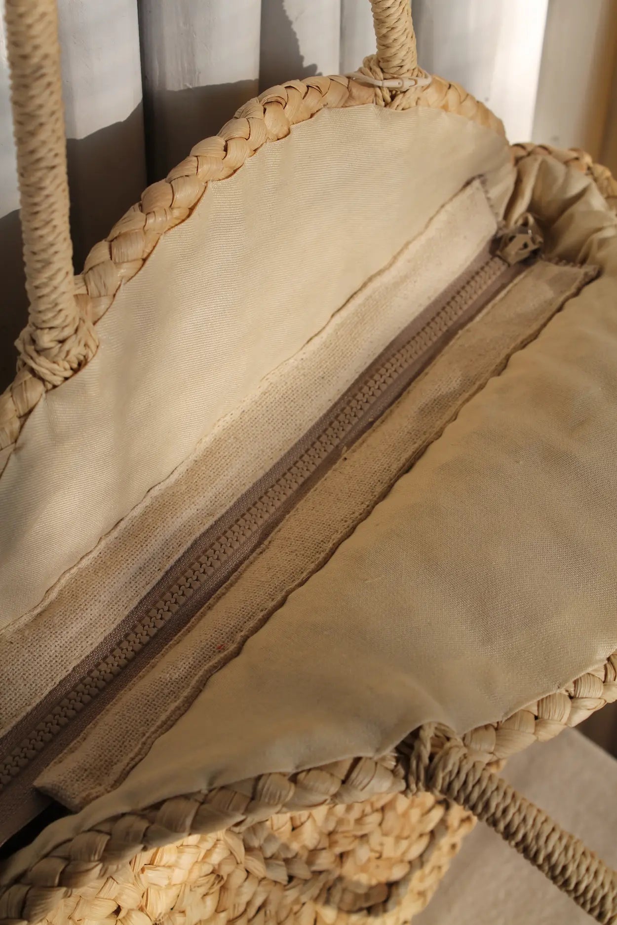 A round woven bag. 