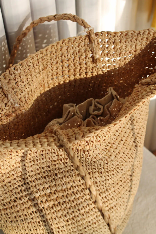 A brown woven bag.