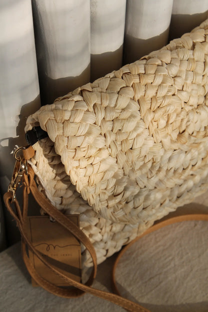 A brown woven bag.