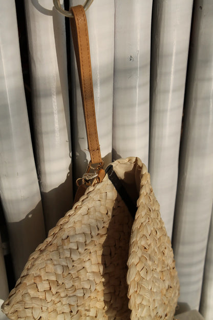 A brown woven bag.