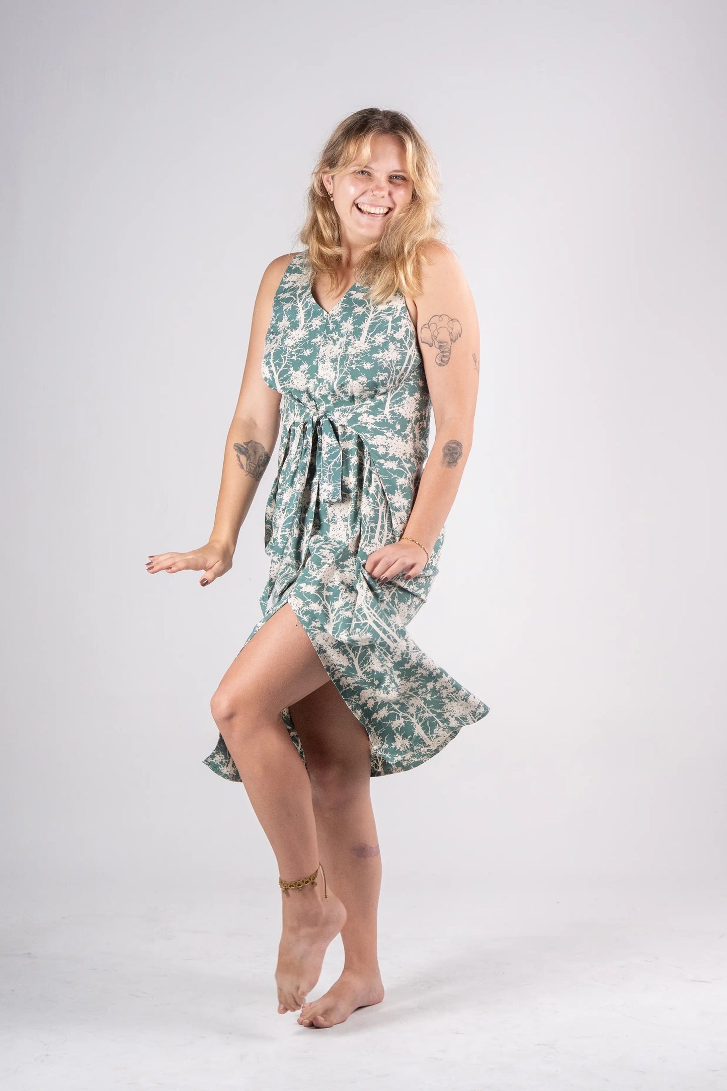Woman wearing a floral dress on a white background
