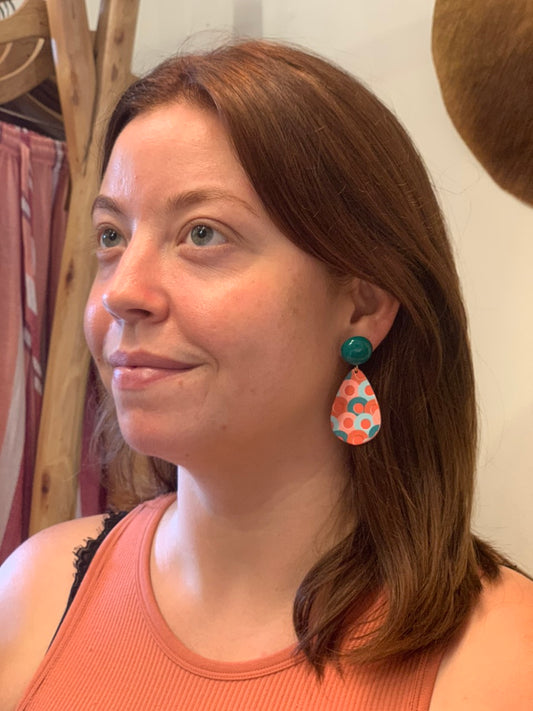 woman wearing boho style spiral silver earings